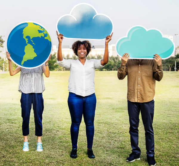 People holding images of clouds and planet