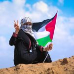 Peace in Gaza - image of woman with Palestine flag
