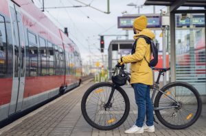 On his way to work, a biker waits for the subway to pull up to step inside. Photo Credit: Lorenzo Capunata
