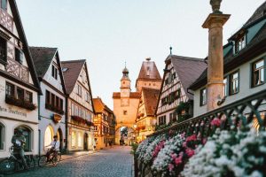 A street in Germany is lined with picturesque half-timbered houses, in a walkable neighborhood that many enjoy. Photo Credit: Roman Kraft